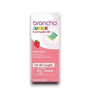 Bronchostop Junior Cough Syrup 200ml – Pink and white box with measuring cup, labelled “From 3 years +”, natural cough relief.