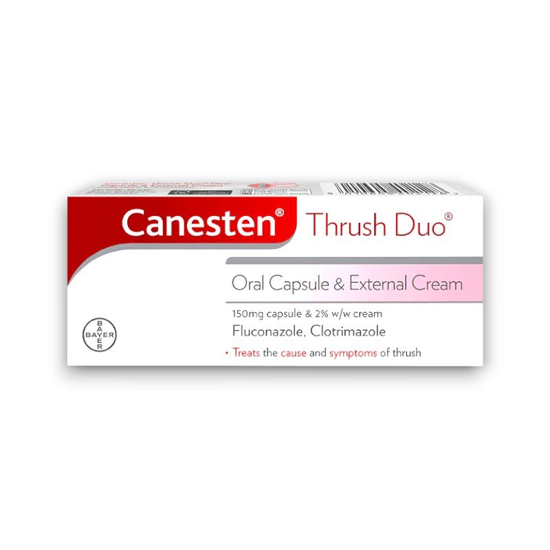 Canesten Thrush Duo packaging featuring a white and red box with pink and silver accents. Text on the front highlights that the product contains a 150mg Fluconazole capsule and 2% w/w Clotrimazole cream, designed to treat both the cause and symptoms of thrush.