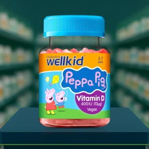 Vitabiotics Wellkid Peppa Pig Vitamin D soft jellies, 30 pack. Bright pink and purple box with Peppa Pig cartoon character, text “Vitamin D 10µg”, vegetarian and vegan strawberry flavour gummies for children aged 3–7 years.