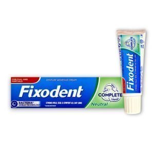 Fixodent Complete Neutral Denture Adhesive Cream 40g with Bacteria Shield Technology for full and partial dentures, offering strong hold, seal, and comfort all day.