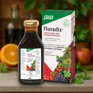 Floradix Liquid Iron 500ml bottle with measuring cap and packaging. Brown glass bottle with orange and red box labelled “Floradix Liquid Iron and Vitamins”. Food supplement with herbal extracts and fruit juice concentrates containing iron, vitamins B1, B2, B6, B12 and C, suitable for vegetarians.