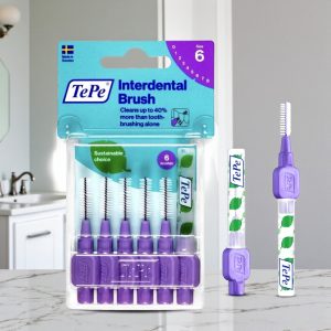 TePe Interdental Brushes Purple 1.1 mm ISO 6 pack, purple handle dental interdental brushes for cleaning wide gaps between teeth, TePe branding visible.